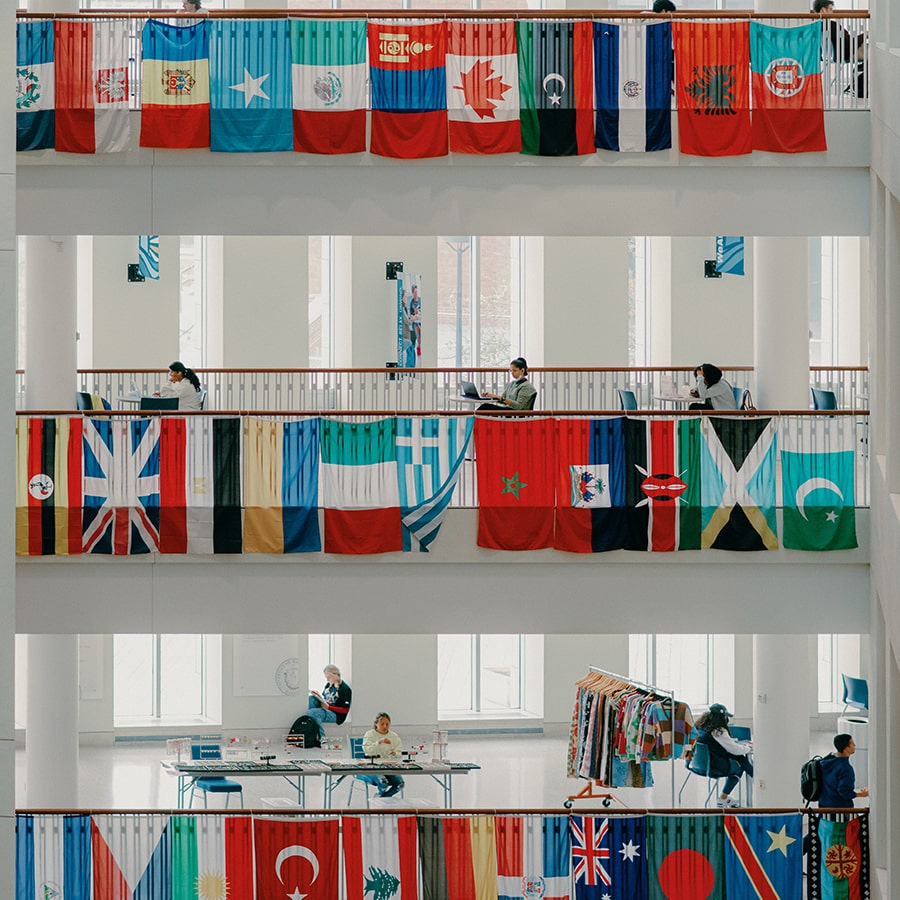 Flags in campus center medium view