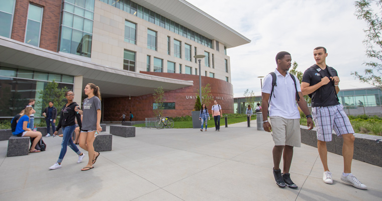 Students walk outside University Hall 