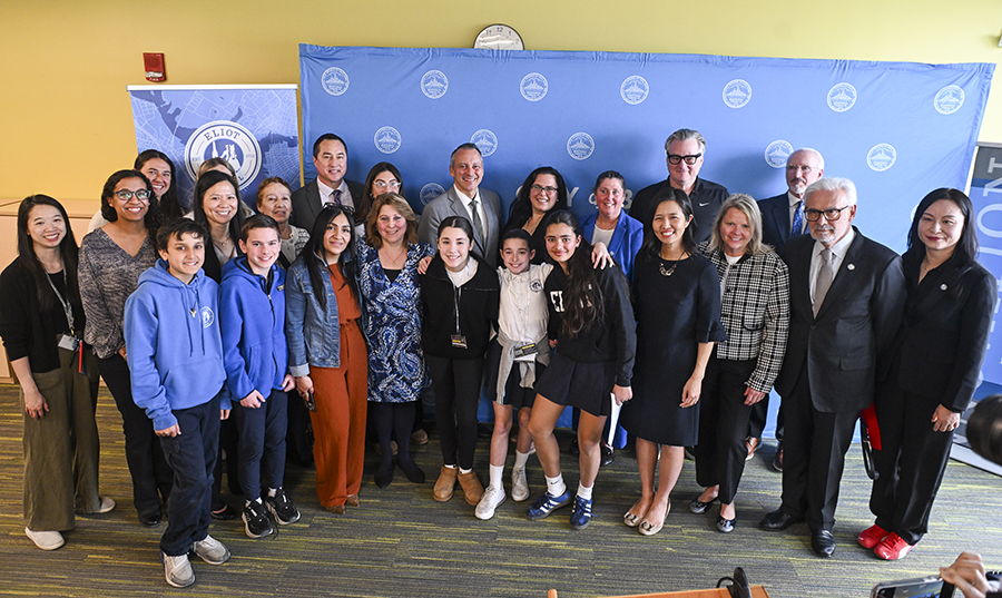 BPS students pose with university and city officials