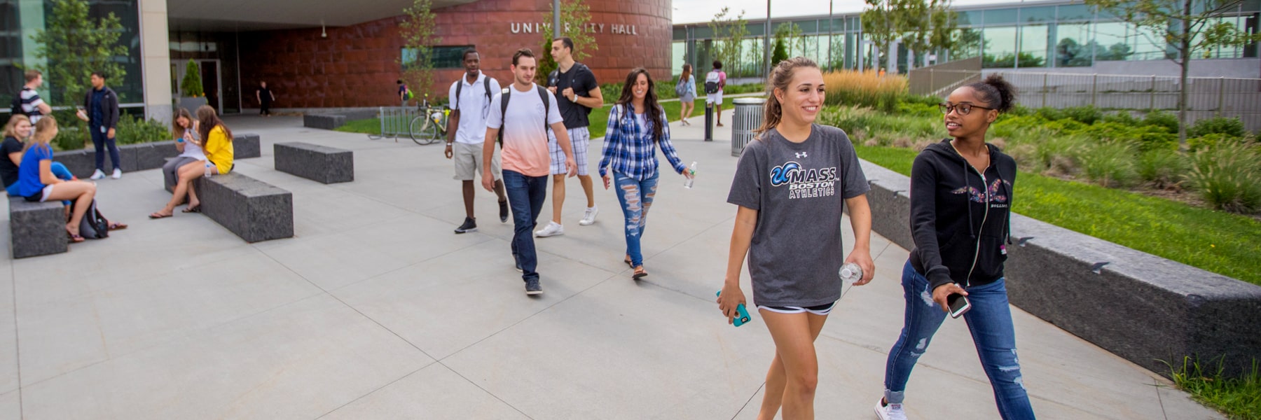 students walking outside university hall